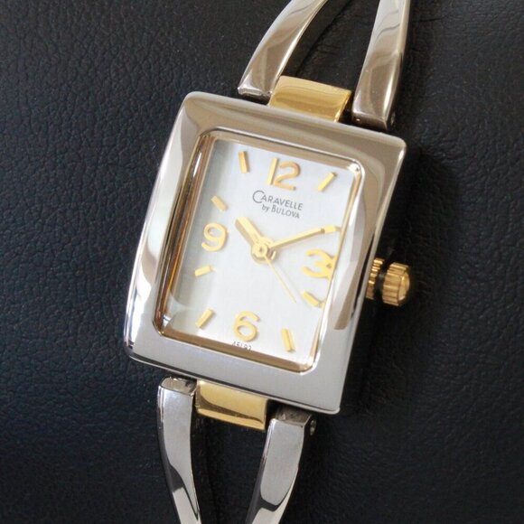 Bulova Accessories - Caravelle Ladies Silver Tone With Gold Accents ½ Bangle Bracelet MOP Dial 16mm